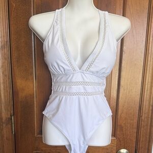 White One-Piece Swimsuit with Crochet Details